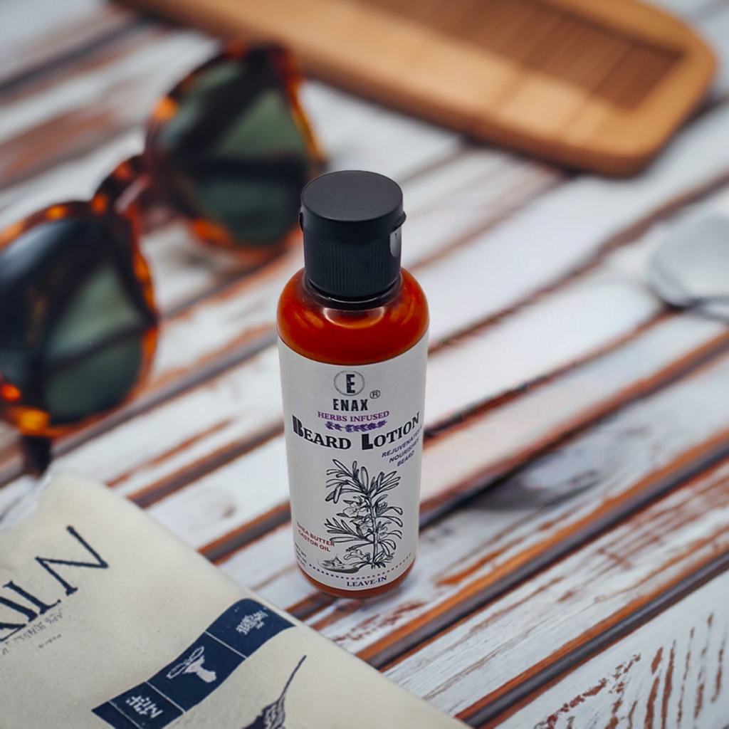Beard Lotion: ENAX Herb Infused Beard Lotion Facial Care. 100ml bottle of (ENAX) Beard Lotion. Grey wooden table with a book, sunglasses and comb. Front Side.