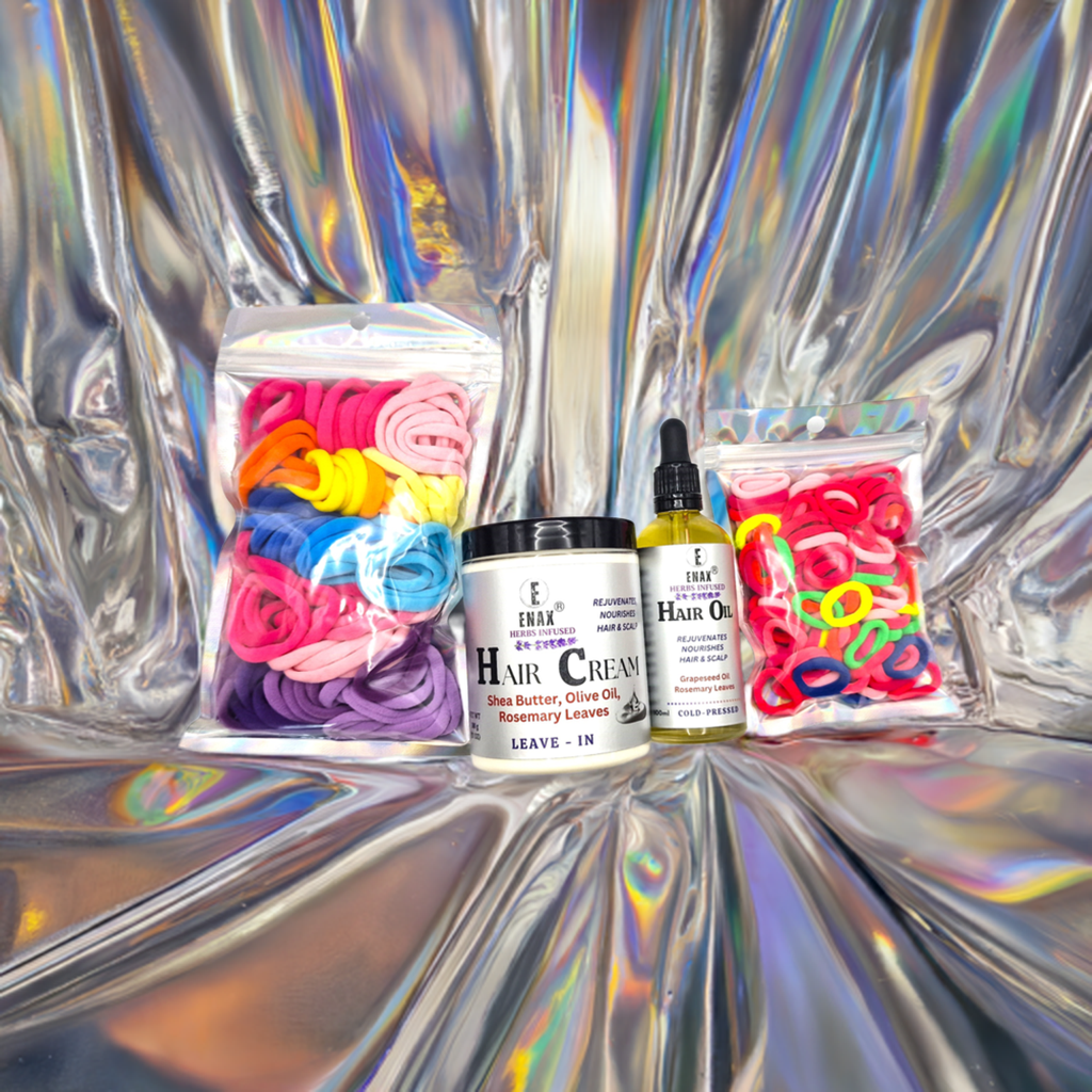 Children Care Pack3: ENAX Hair Cream, Hair Oil, Girl's Hair Ties & Toddler's Hair Ties. ENAX Girl's Hair Ties to the left, 300g jar of (ENAX) Hair Cream, 100ml bottle of (ENAX) Hair Oil in the middle. ENAX Baby & Toddler's Pink Hair Ties to the right. silver foiled shiny background. Front Side.