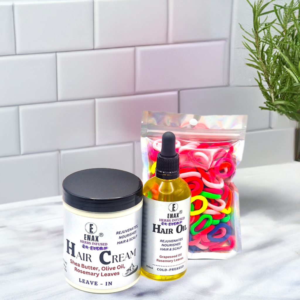 Children Care Pack1: ENAX Hair Cream, Hair Oil & Toddler's Hair Ties. 300g jar of (ENAX) Hair Cream to the left, 100ml bottle of (ENAX) Hair Oil in the middle, ENAX Baby & Toddler's Hair Ties to the far right. 120 small-sized pink Hair Ties. White tiled background and marble countertop. Front side.