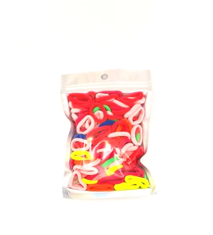 Baby & Toddler's Hair Ties: ENAX Hair Bands, One silver pack of (ENAX) colorful small sized Hair Ties. Mostly light and dark Pink coloured Hair Ties. 120 hair ties inside each pack, one pack in picture. Front Side.