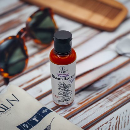 Beard Lotion: ENAX Herb Infused Beard Lotion Facial Care. 100ml bottle of (ENAX) Beard Lotion. Grey wooden table with a book, sunglasses and comb. Front Side. 
