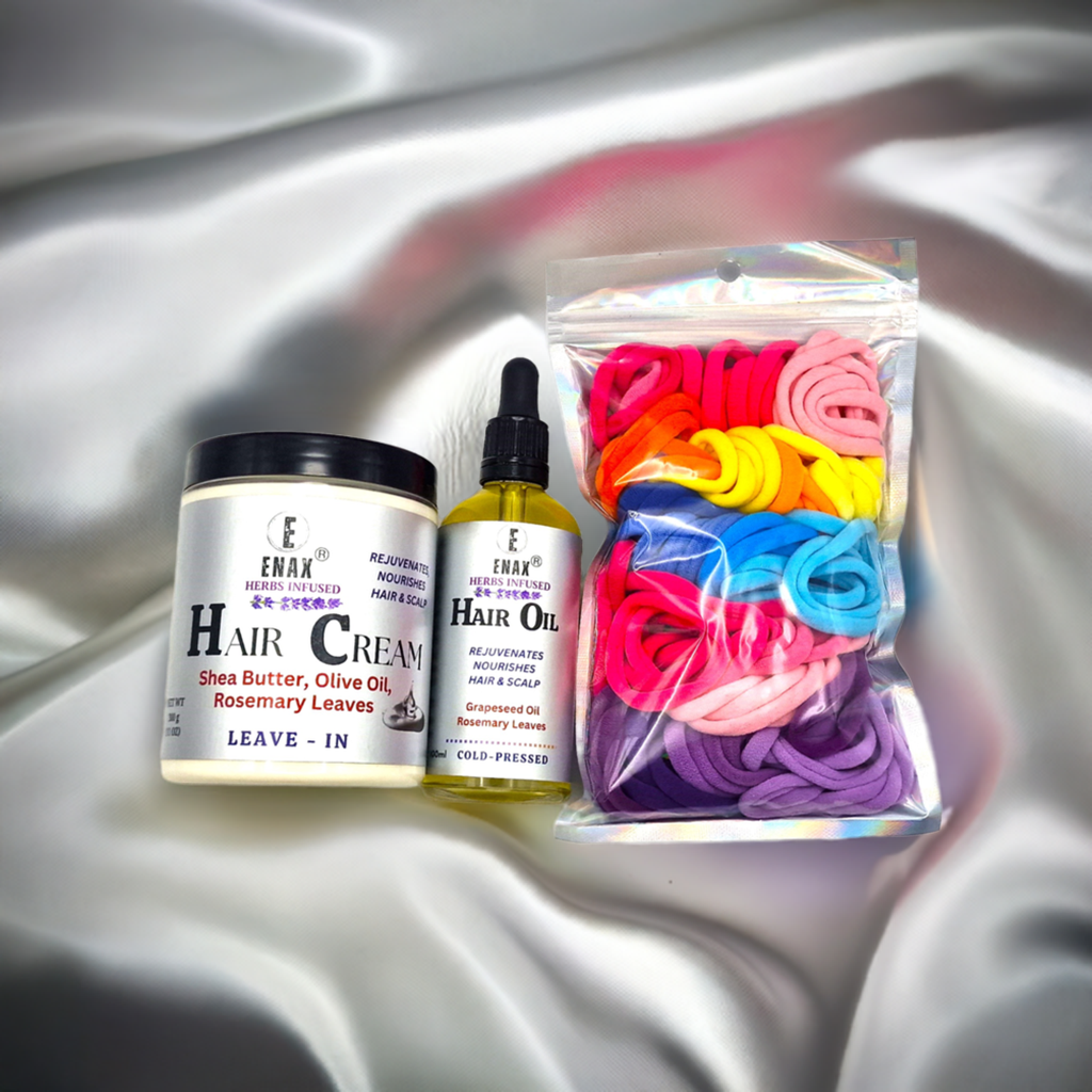 Children Care Pack2: ENAX Hair Cream, Hair Oil & Girl's Hair Ties. 300g jar of (ENAX) Hair Cream to the left, 100ml bottle of (ENAX) Hair Oil in the middle, One packet of (ENAX) Girl's Hair Ties to the far right. 80 medium-sized Multi-coloured hair ties inside packet. For Healthy Hair growth. Silver clothe background. Front Side.