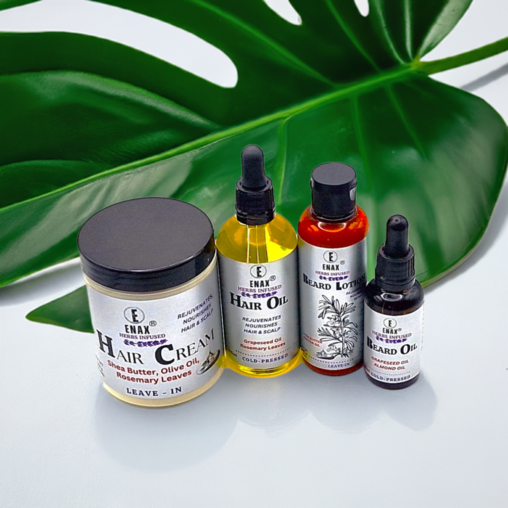 Family Pack1: ENAX Hair Cream, Hair Oil, Beard Lotion & Beard Oil. 300g jar of (ENAX) Hair Cream to the left, 100ml bottle of (ENAX) Hair Oil, 100ml bottle of (ENAX) Beard Lotion in the middle, 30ml bottle of (ENAX) Beard Oil to the far right. For healthy hair growth and maintenance. Flower on white countertop background. Front Side