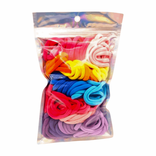 Girl's Hair Ties: ENAX Multi-Coloured Hair Bands, One silver pack of (ENAX) colorful medium-sized Hair Ties. 80 hair ties inside each pack. White background. Front Side.